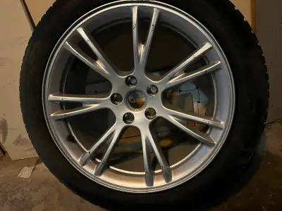 The package is Tesla model Y original winter rims/tires. Includes: 4 Tesla models Y winter tires, on...