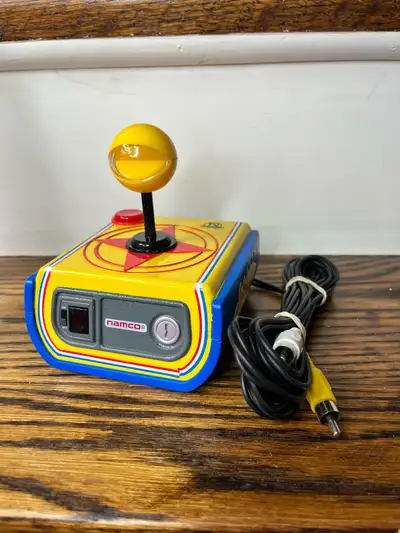 Relive the arcade days with this vintage Super Pac-Man plug and play console by Namco, offering hour...
