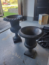 Two Cast iron Urns