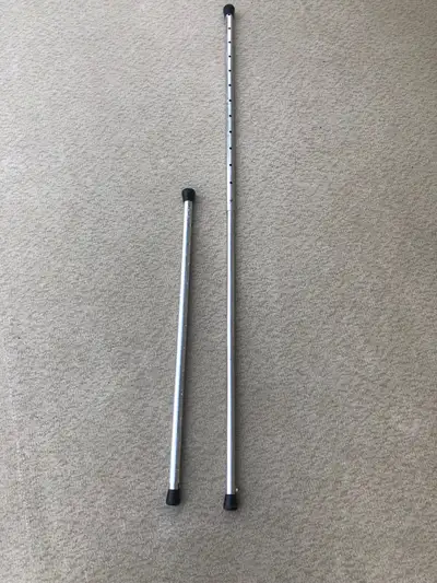 Aluminum extension poles - set of 2 Adjusts from 28.5 to 53 inches Rubber ends Snap grommet on one e...