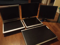 Assorted computers monitors and parts