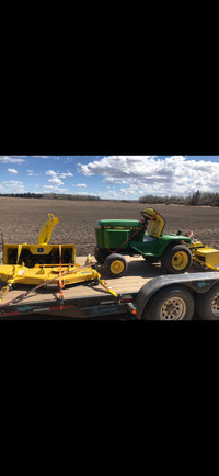 1985 John Deere 318 tractor with mower, snowblower, rototiller