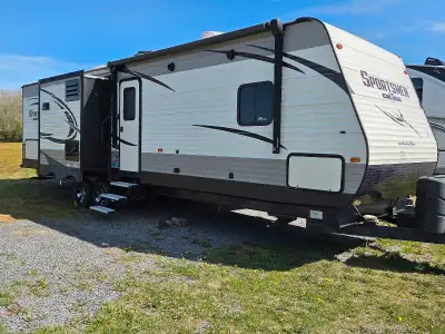 Gorgeous 36' 3 slide outside, Center Island... Front master walk around bedroom with door the bathro...