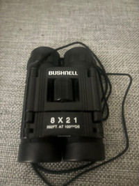 Bushnell 8×21 binoculars with case like new