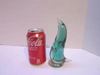 This bird is in good used condition with no damage. It measures 6&1/2 inches tall, 3 inches long and...