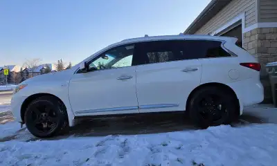 Winter ready 3 row, 7 seat luxury family SUV. Black leather interior. Well maintained and drives exc...