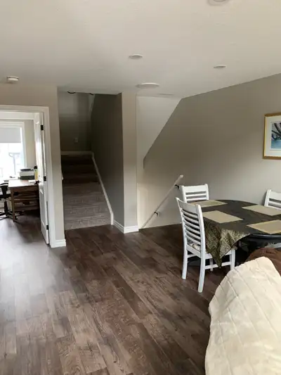 Located in Stratford's north end this bright, clean and spacious walk-up condo offers quartz counter...