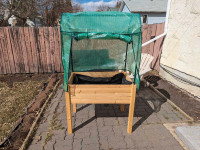 Raised planter with greenhouse 