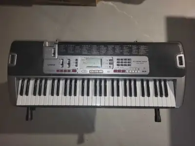 1.Used Casio LK210 2.with Stand and adapter 3.Microphone 4. 80% New