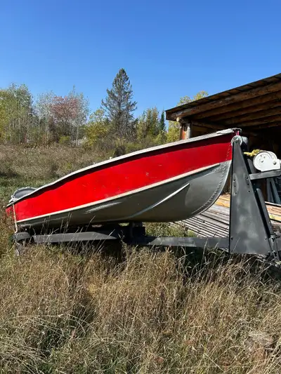 14’ aluminum boat with no leaks. Has a piece missing at the top of the nose that you can see at firs...