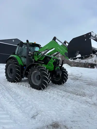 .For sale 2010 Cat Lexion 585R combine with P516 Lexion header with swath master pick up, tracks, RW...