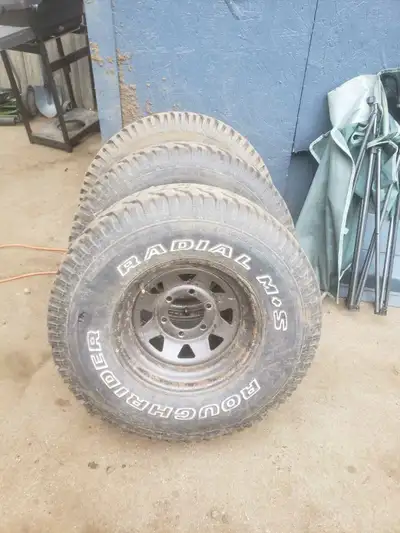 3 31x10.5x15 tires and 4 rims. Chevy 6 stud bolt pattern. 4th tire has a hole but rims is good. 150