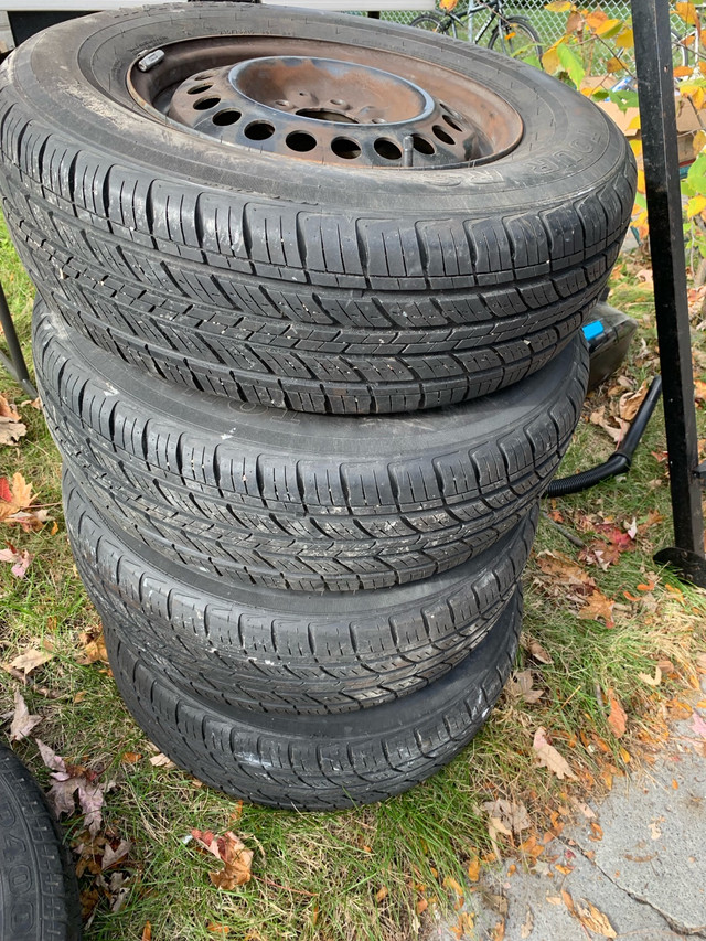 P 205 /70R15 and P 215/70R15  tires on rims in Tires & Rims in City of Montréal