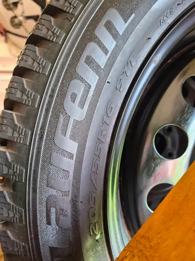 Lauren Ice T snow tires and rims for sale used approximately 3 to 4 weeks as new....size is 205 55r...