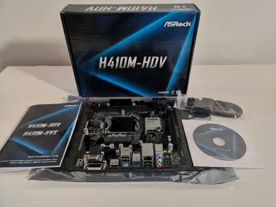 Carte Mère ASRock H410M-HDV pratiquement neuve. Fonctionne très bien, vendu avec boite et manuel.