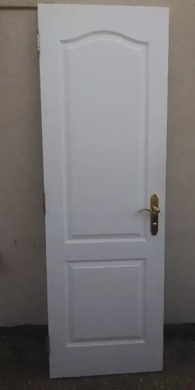 Solid Interior Doors Includes hinges and door handles 1- 26"x78 5/8" with lock handle. Asking $80 2-...