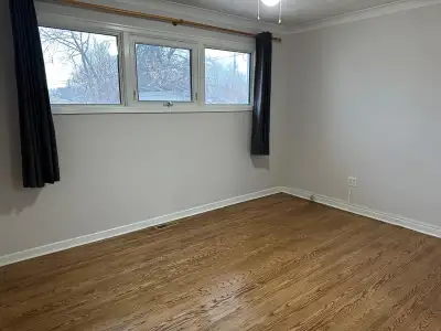 A large main-floor room in a fully furnished 3-bedroom 1 bath house with a huge backyard is availabl...