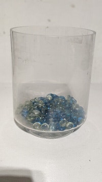 9" Glass vase/fish bowl with clear+blue marbles