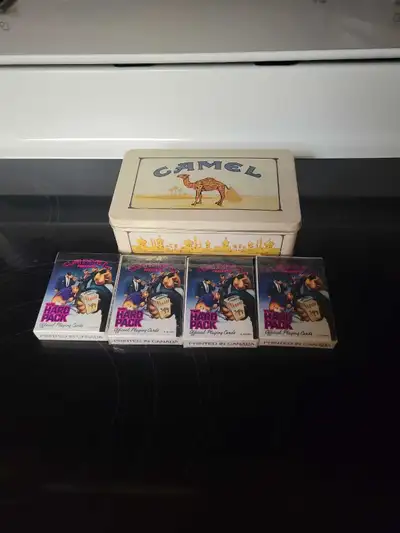Vintage Camel collectable tin with poker chips and 4 decks of cards.( 3 decks are sealed)