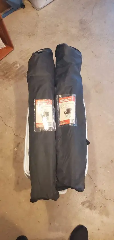2 new folding chairs with carry cases. Never used.