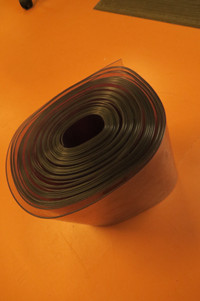8-1/4" wide x 42 foot roll of soft flexible transparent material