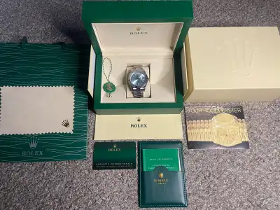 Light blue day date Automatic movement Brand new Box and papers