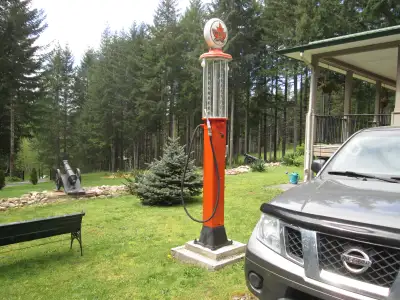 Foe Sale antique gas pump for sale $4,500 call 250 337 -1892 with solar light stays lit till 4 in mo...