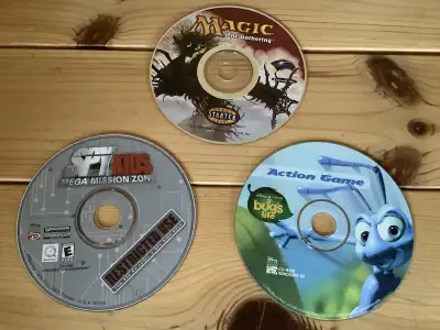 A bug’s life Spy Kids Mega Mission Zone Magic The Gathering All three for $5