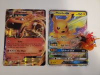 2 big size Pokemon cards and 1 figure Lot