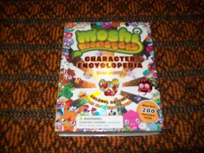 Moshi monsters character encyclopedia with figure book, View more