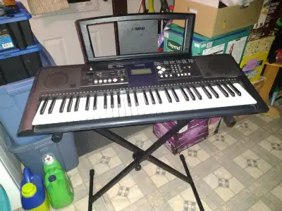Comes with adjustable stand, AC adapter and music holder. In great condition. No issues. Clean and s...