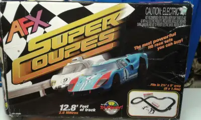 AFX Super Coupes Tri-Power Slot Car Set., View more