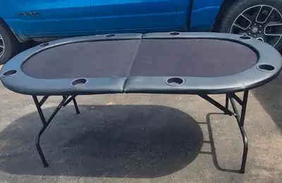 Get ready to host poker night with this foldable poker table! It's in good condition and ready for y...