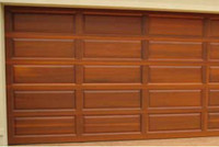 2 beautiful Cedar Overhead Garage Doors