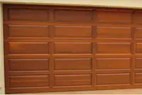 2 beautiful Cedar Overhead Garage Doors
