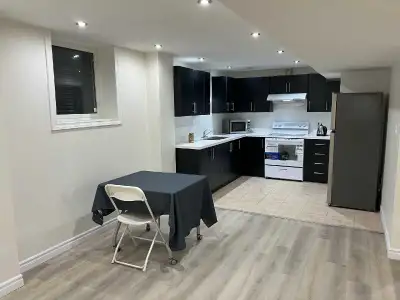 ,Beautiful 2 bedrooms basement apartment Separate entrance separate laundry room Huge living room an...