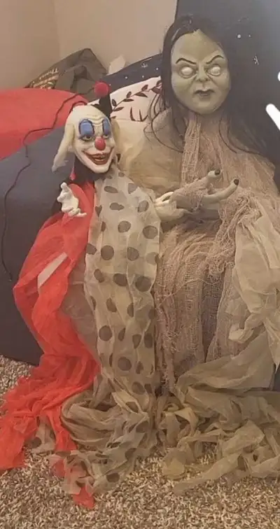 Scary hanging clown is $10. & Scary hanging girl is $20.