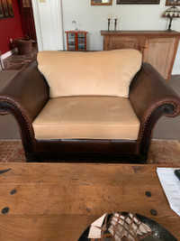 Leather and upholstered chair