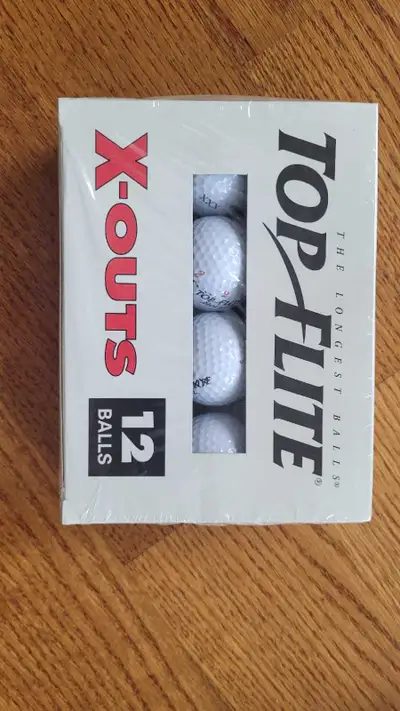 A box of 12 Top flite golf balls, View more