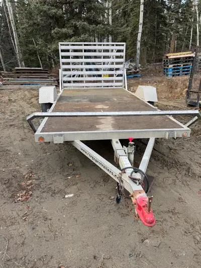 This is a used Cargo Pro trailer 6’ x 12’ with a sturdy flatbed, perfect for hauling equipment or ma...