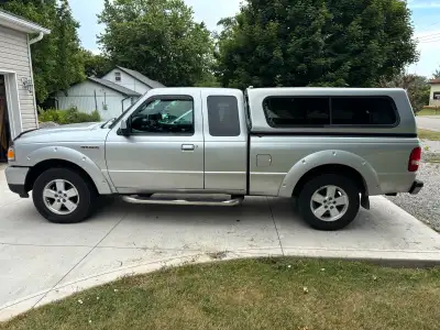 4L 6cyl good condition, clean, new wheels and tires, cap, running boards, upper window guards, trail...
