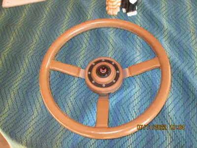 THIS JEEP STEERING WHEEL , I will say 9 out of 10 it is leather wrapped and has a horn button fits 1...