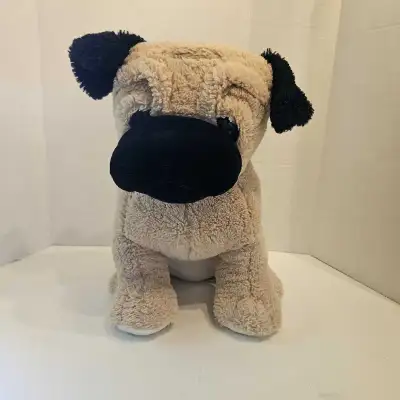 Delve into the charm of yesteryear with the 1995 Peek-A-Boo Toys Pace The Pug, a vintage stuffed ani...