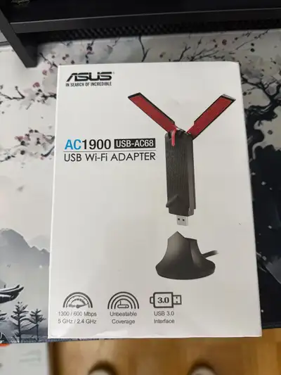 I am selling a nearly new Asus AC1900 USB Wi-Fi adapter, model USB-AC68, that delivers lightning-fas...