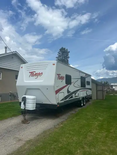 2007 Tango Travel Trailer for sale. Well built, 30’ long by 8’ wide.