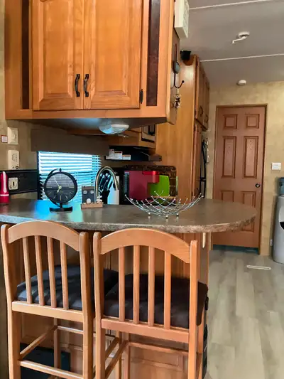 One owner, Keystone Retreat Park model RV on seasonal lot located at Spruce Sands just north of Giml...