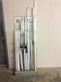 Assortment of fluorescent tubes and rack