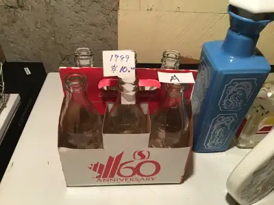 $10. Each 6 pack. .None have any content… .Blue bottle, mountain soda is $5. . None have cracks or c...