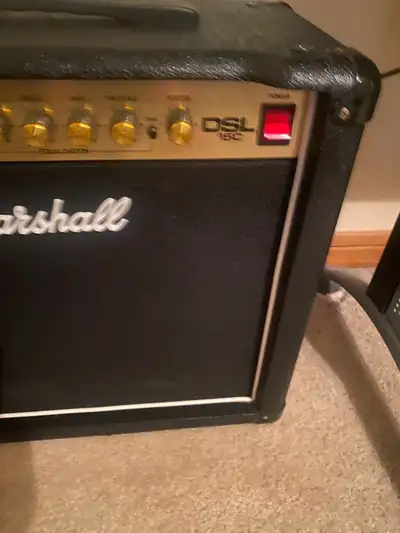 This is a used Marshall DSL15C tube amp in good condition, perfect for guitarists seeking classic Ma...