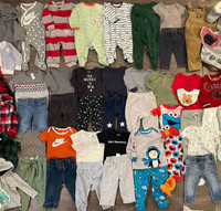 Gender Neutral Clothing.  6-12 months. 52 items